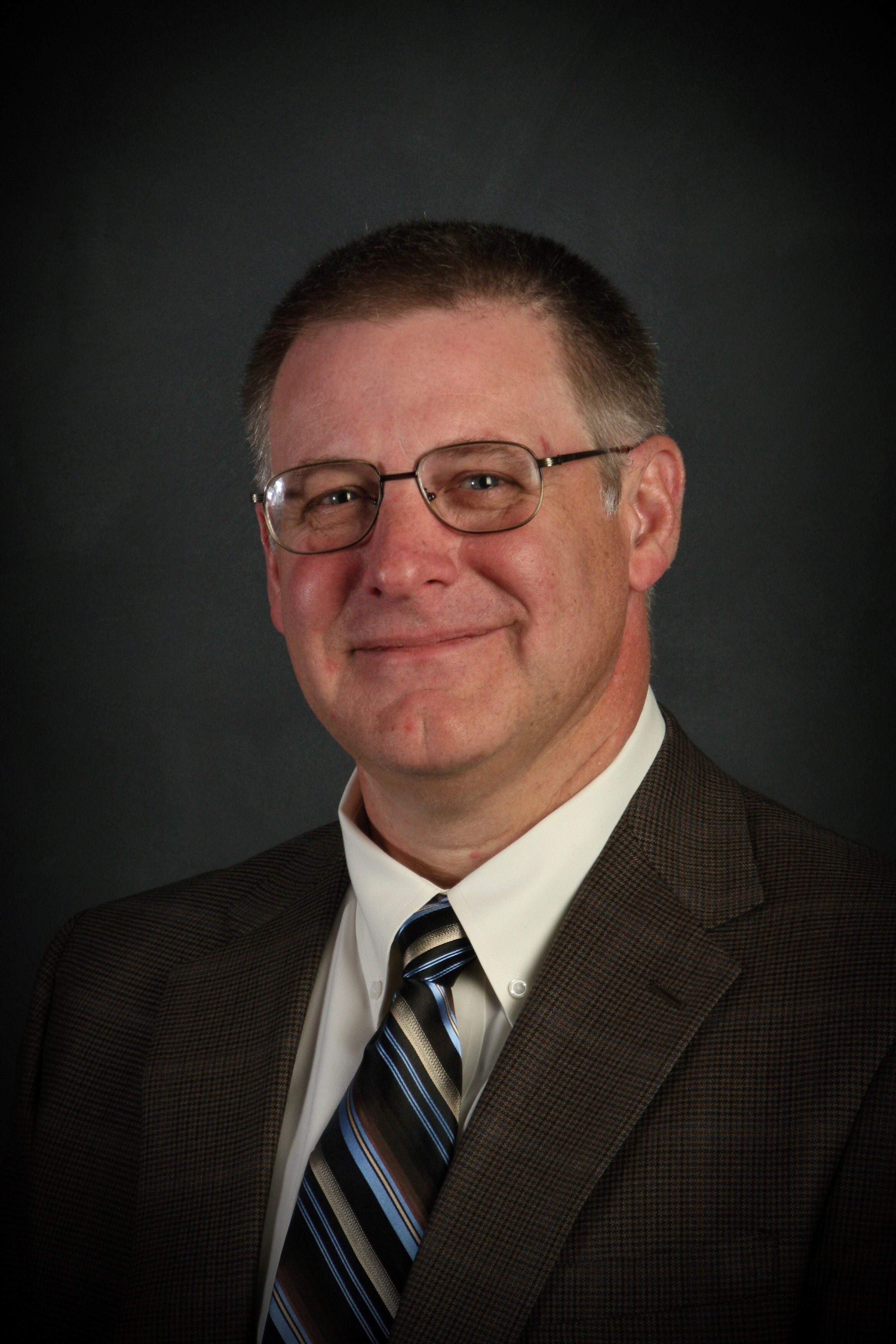 A headshot of the author of Proles, Joel E. Lorentzen